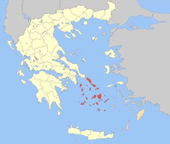 Blue background with gray, red, and white land and islands